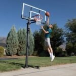 Lifetime Adjustable Bolt Down Basketball Hoop (60-Inch Tempered Glass) - Image 18
