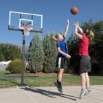 Lifetime Adjustable Bolt Down Basketball Hoop (60-Inch Tempered Glass) - Image 12