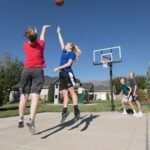 Lifetime Adjustable Bolt Down Basketball Hoop (60-Inch Tempered Glass) - Image 15